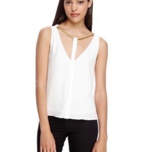 BCBG cut out top with gold neck chain size MEDIUM. NEVER WORN. Color: BLACK